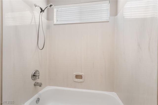 bathroom with shower / washtub combination