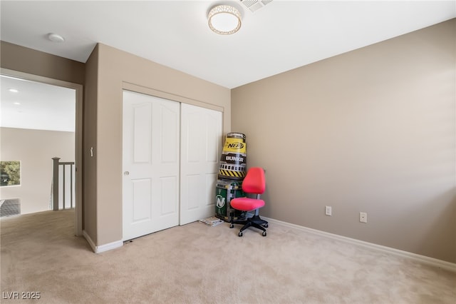 interior space with visible vents, baseboards, and carpet flooring
