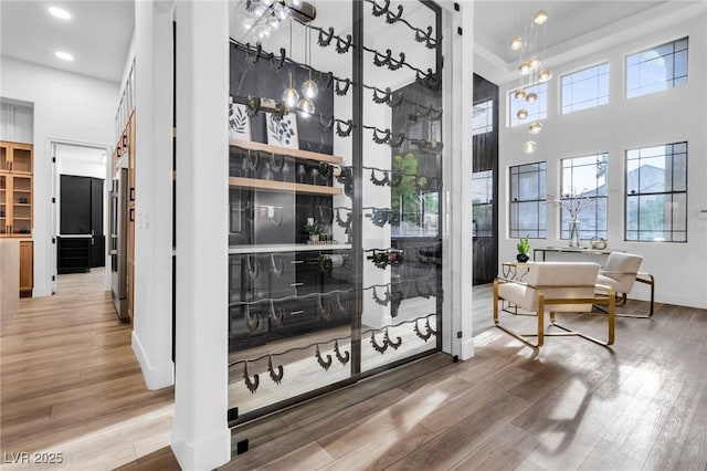 1350 Rossini St, Henderson, NV 89052 - wine cellar featuring wood finished floors, recessed lighting, baseboards, and a towering ceiling