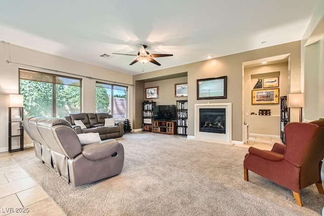 7513 Java Sparrow St, North Las Vegas, NV 89084 - living area with a ceiling fan, a glass covered fireplace, baseboards, visible vents, and recessed lighting