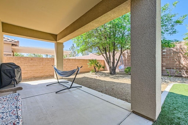 7513 Java Sparrow St, North Las Vegas, NV 89084 - view of patio / terrace featuring grilling area and a fenced backyard