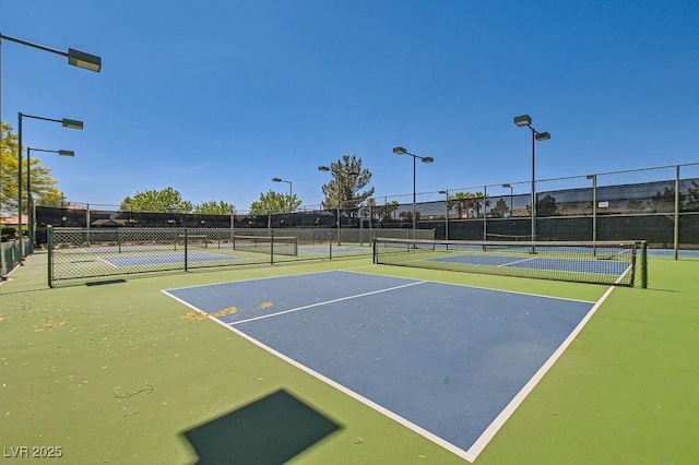 7513 Java Sparrow St, North Las Vegas, NV 89084 - view of tennis court with fence