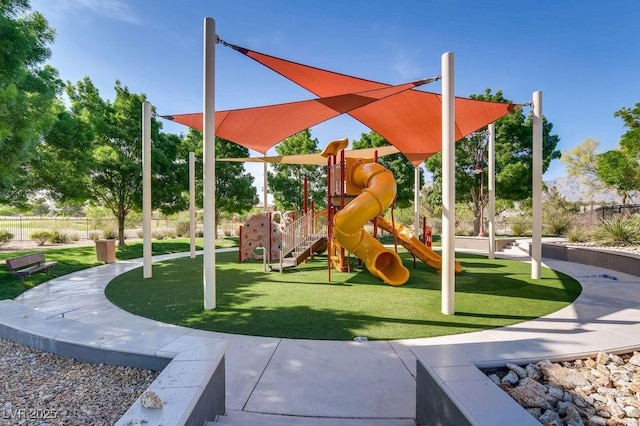 7513 Java Sparrow St, North Las Vegas, NV 89084 - community play area featuring fence and a lawn