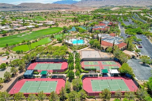 bird's eye view featuring a residential view, golf course view, and a water and mountain view