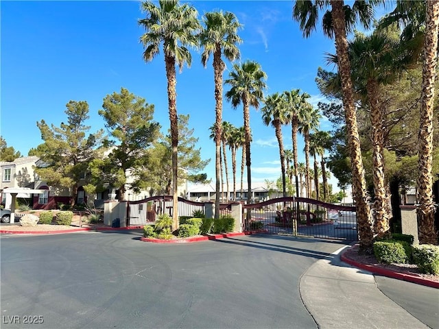 5055 W Hacienda Ave Unit 1095, Las Vegas, NV 89118 - view of street featuring a gate, a gated entry, and curbs