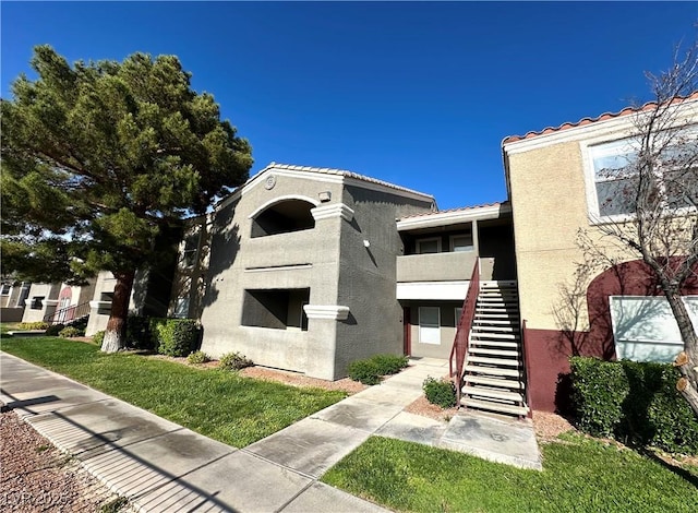 5055 W Hacienda Ave Unit 1095, Las Vegas, NV 89118 - view of building exterior with stairway