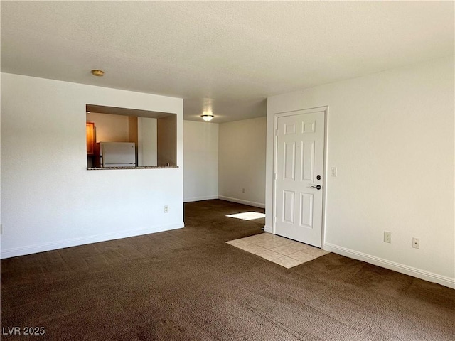 5055 W Hacienda Ave Unit 1095, Las Vegas, NV 89118 - carpeted spare room with baseboards