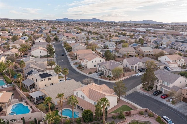 drone / aerial view with a mountain view and a residential view