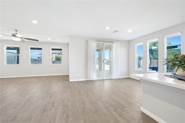 1512 Sagefield Way, Logandale, NV 89021 - unfurnished living room featuring light wood-style flooring, recessed lighting, and ceiling fan