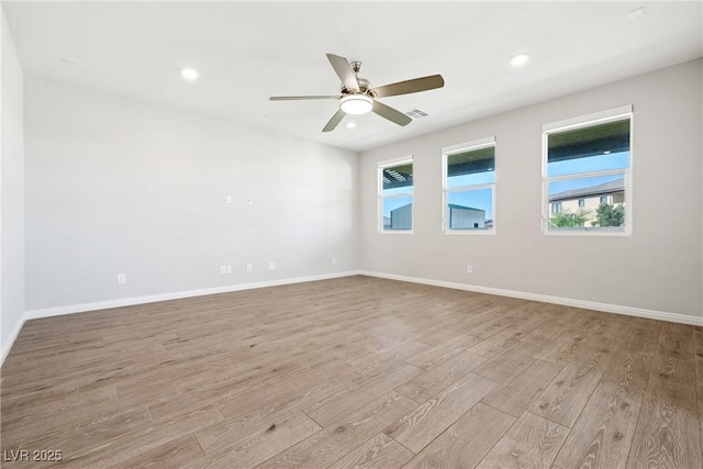 1512 Sagefield Way, Logandale, NV 89021 - unfurnished room with wood finished floors, a ceiling fan, and recessed lighting