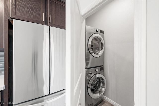 1512 Sagefield Way, Logandale, NV 89021 - laundry room featuring stacked washer / drying machine and baseboards