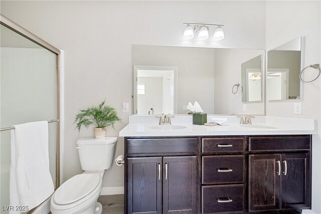 1512 Sagefield Way, Logandale, NV 89021 - full bathroom featuring double vanity and a shower with door