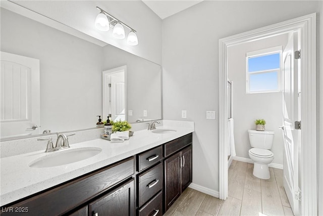 1512 Sagefield Way, Logandale, NV 89021 - full bath with double vanity, wood finished floors, and a shower