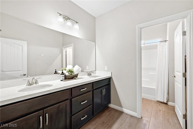 1512 Sagefield Way, Logandale, NV 89021 - full bathroom with wood finished floors, double vanity, and shower / bath combination with curtain