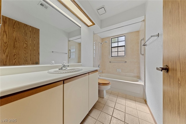 full bathroom featuring tile patterned floors, toilet, visible vents, shower / washtub combination, and vanity