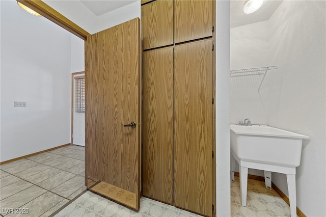 bathroom featuring baseboards