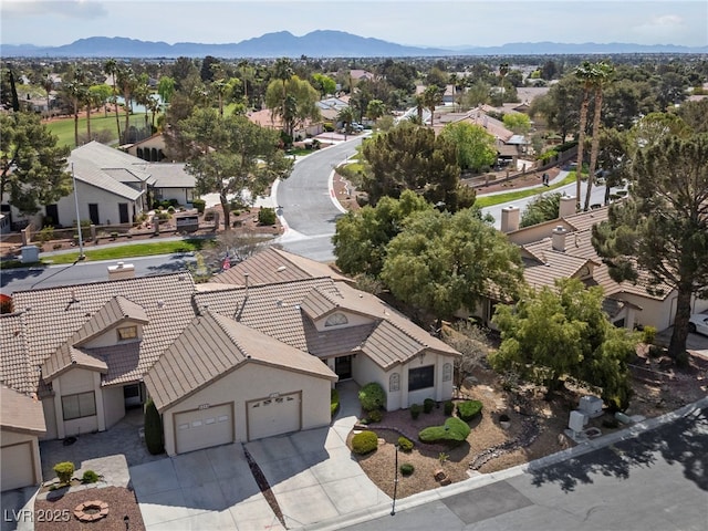 bird's eye view featuring a mountain view and a residential view