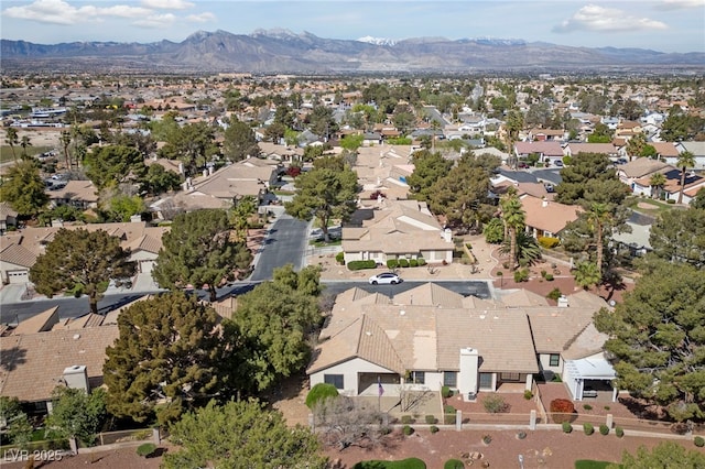 bird's eye view featuring a mountain view and a residential view