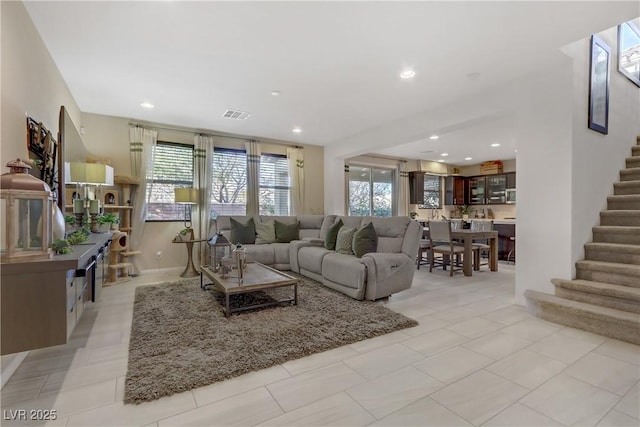 8992 Sparkling River Ct, Las Vegas, NV 89178 - living room with stairs, healthy amount of natural light, and recessed lighting