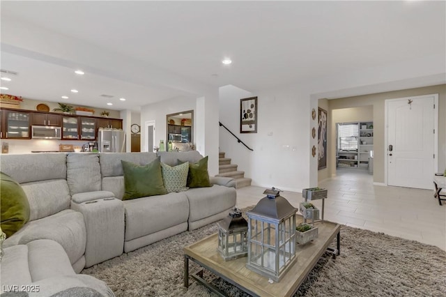 8992 Sparkling River Ct, Las Vegas, NV 89178 - living area featuring stairs, recessed lighting, light tile patterned floors, and baseboards
