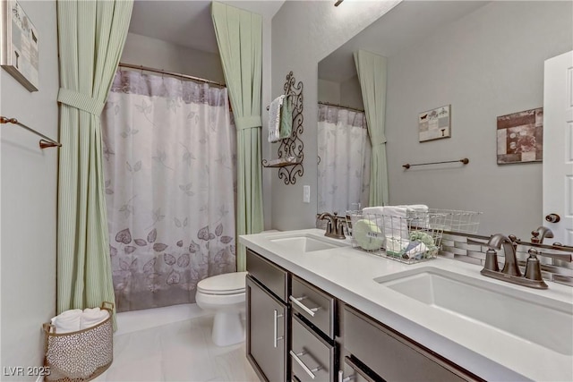 8992 Sparkling River Ct, Las Vegas, NV 89178 - full bath featuring toilet, double vanity, a shower with curtain, and decorative backsplash