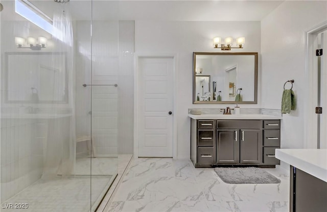 8992 Sparkling River Ct, Las Vegas, NV 89178 - bathroom featuring vanity, a walk in shower, and marble finish flooring