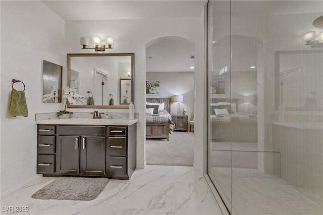 8992 Sparkling River Ct, Las Vegas, NV 89178 - ensuite bathroom featuring marble finish flooring, vanity, and walk in shower