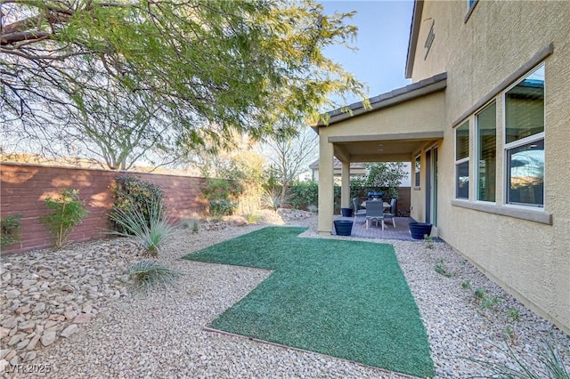 8992 Sparkling River Ct, Las Vegas, NV 89178 - fenced backyard with a patio