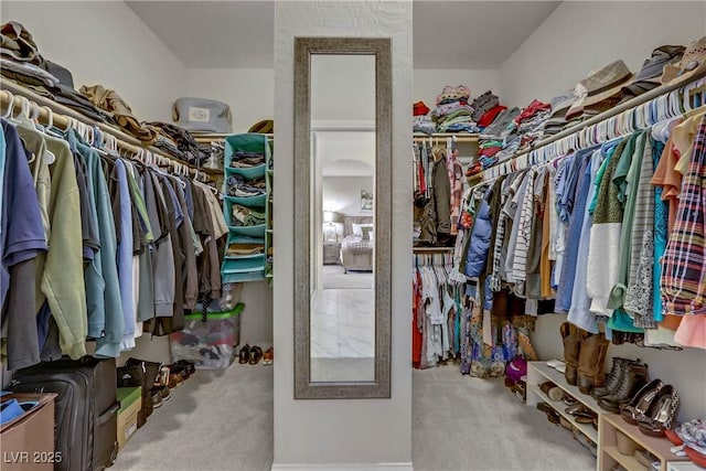 8992 Sparkling River Ct, Las Vegas, NV 89178 - walk in closet featuring carpet floors