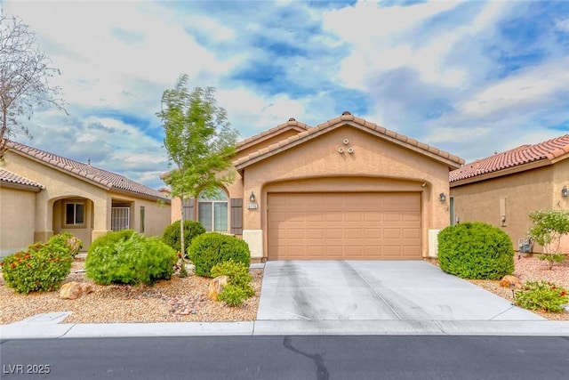 6116 Tokara Ave, Las Vegas, NV 89122 - mediterranean / spanish-style home featuring stucco siding, a tile roof, driveway, and a garage