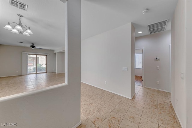 6116 Tokara Ave, Las Vegas, NV 89122 - spare room with a chandelier, visible vents, and baseboards
