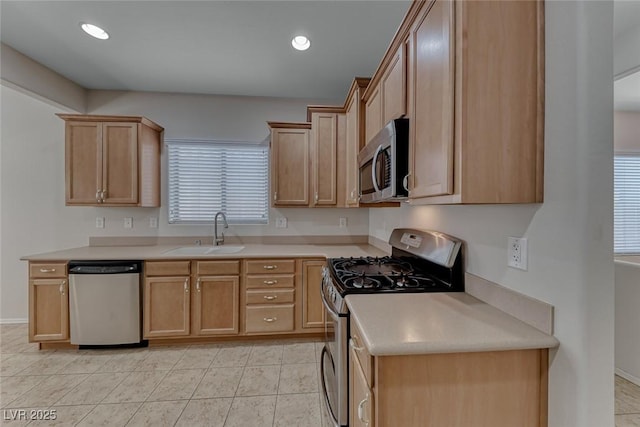 6116 Tokara Ave, Las Vegas, NV 89122 - kitchen with plenty of natural light, stainless steel appliances, light countertops, and a sink