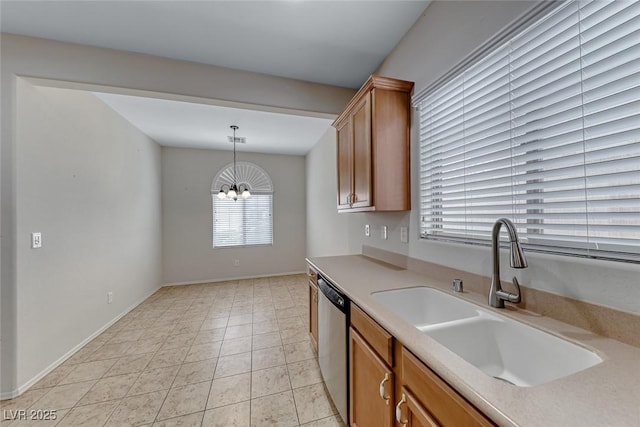 6116 Tokara Ave, Las Vegas, NV 89122 - kitchen featuring an inviting chandelier, light countertops, dishwasher, a healthy amount of sunlight, and a sink