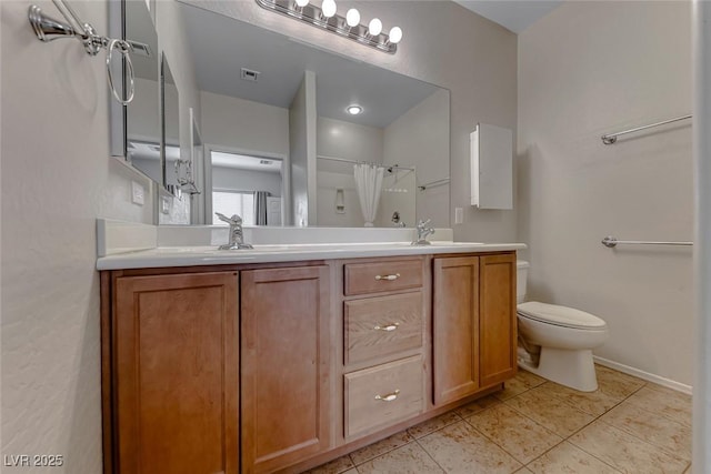 6116 Tokara Ave, Las Vegas, NV 89122 - full bath featuring toilet, a shower with curtain, a sink, and double vanity