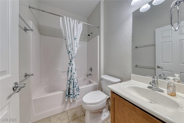 6116 Tokara Ave, Las Vegas, NV 89122 - bathroom with tile patterned floors, shower / bath combo, toilet, a textured wall, and vanity
