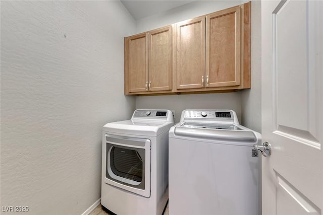 6116 Tokara Ave, Las Vegas, NV 89122 - washroom with washing machine and dryer, cabinet space, and a textured wall