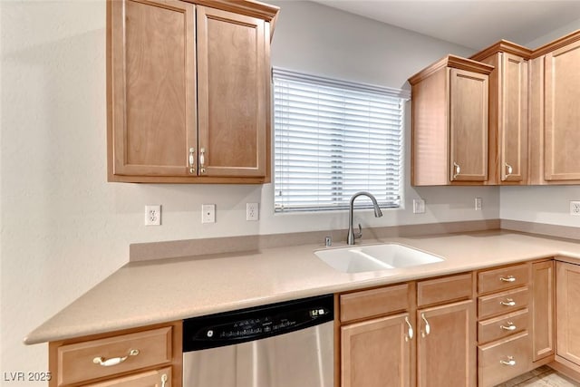 6116 Tokara Ave, Las Vegas, NV 89122 - kitchen with light countertops, dishwasher, light brown cabinetry, and a sink