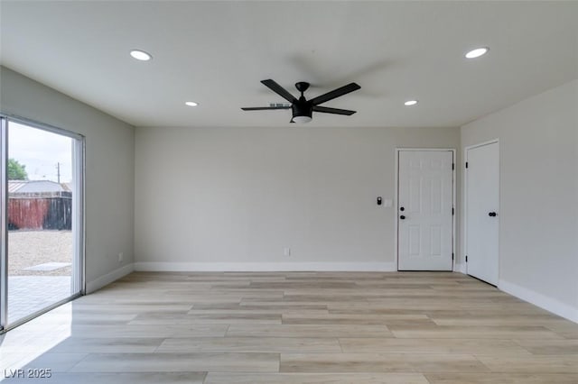 empty room with baseboards, recessed lighting, light wood-style floors, and ceiling fan