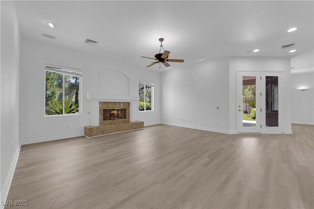 4722 Blue Mesa Way, Las Vegas, NV 89129 - unfurnished living room with recessed lighting, light wood finished floors, a ceiling fan, baseboards, and a high end fireplace