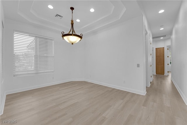 4722 Blue Mesa Way, Las Vegas, NV 89129 - empty room featuring light wood-style floors, recessed lighting, a raised ceiling, and baseboards