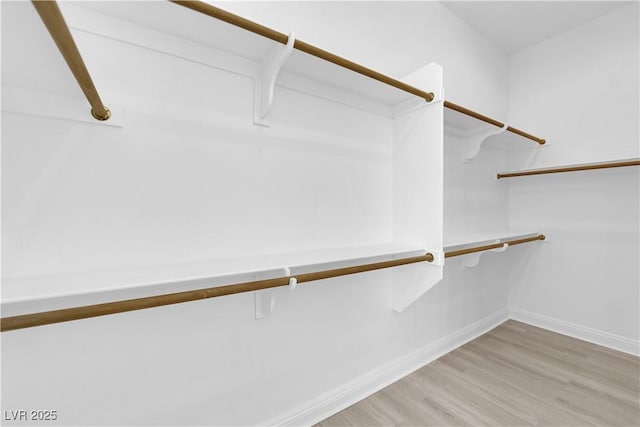 4722 Blue Mesa Way, Las Vegas, NV 89129 - spacious closet with light wood-style floors