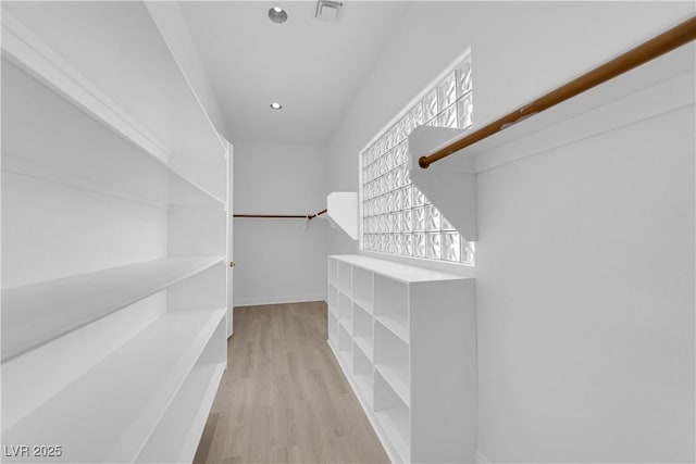 4722 Blue Mesa Way, Las Vegas, NV 89129 - walk in closet featuring light wood finished floors