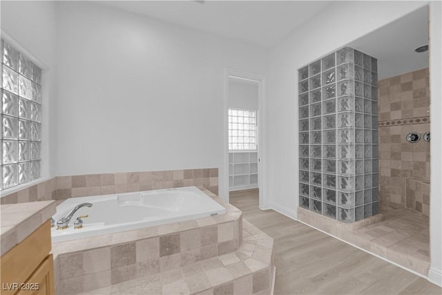 4722 Blue Mesa Way, Las Vegas, NV 89129 - bathroom with a bath, a walk in shower, vanity, and wood finished floors