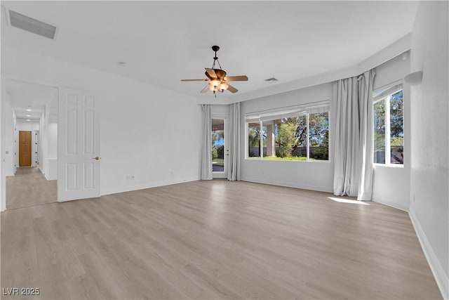 4722 Blue Mesa Way, Las Vegas, NV 89129 - empty room with light wood-style floors, ceiling fan, and baseboards