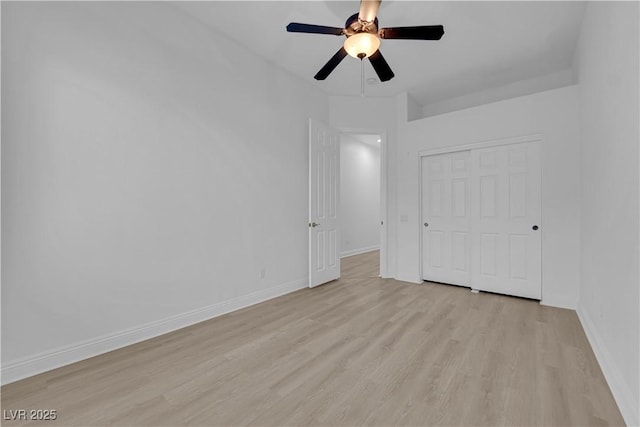 4722 Blue Mesa Way, Las Vegas, NV 89129 - unfurnished bedroom featuring light wood finished floors, a closet, and a ceiling fan