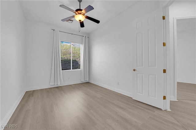 4722 Blue Mesa Way, Las Vegas, NV 89129 - unfurnished room with light wood finished floors, ceiling fan, and baseboards