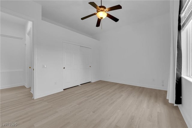 4722 Blue Mesa Way, Las Vegas, NV 89129 - unfurnished bedroom with light wood-style flooring, a closet, baseboards, and a ceiling fan