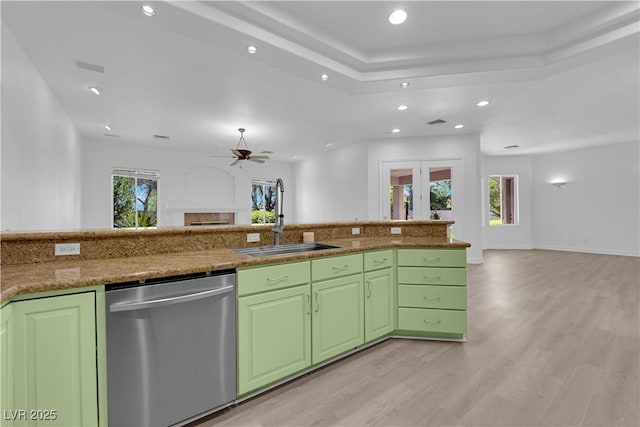 4722 Blue Mesa Way, Las Vegas, NV 89129 - kitchen featuring dishwasher, open floor plan, a sink, light wood-style floors, and recessed lighting