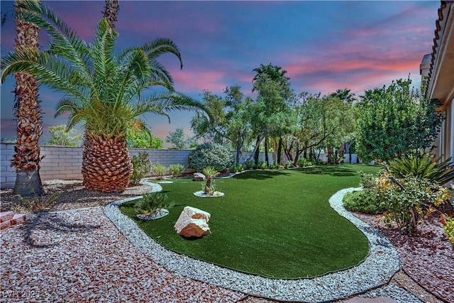 4722 Blue Mesa Way, Las Vegas, NV 89129 - yard at dusk featuring a fenced backyard