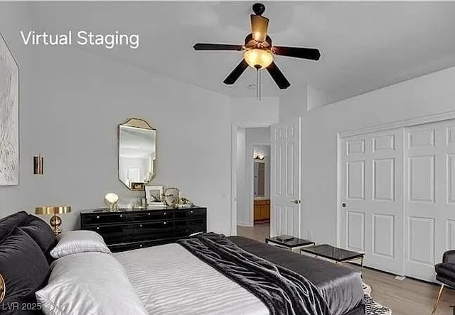 4722 Blue Mesa Way, Las Vegas, NV 89129 - bedroom with light wood finished floors, a ceiling fan, and a closet